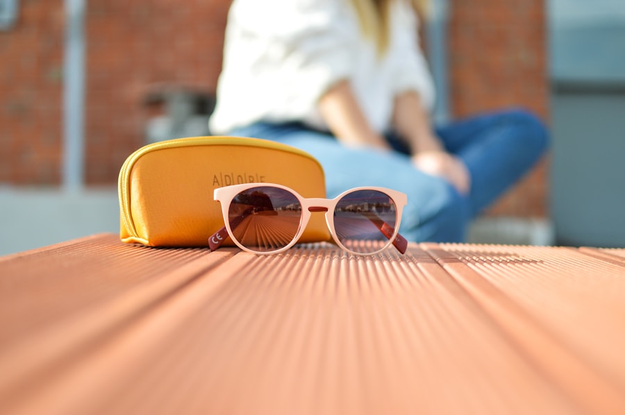 Prescription sunglasses and accessories arranged on a table