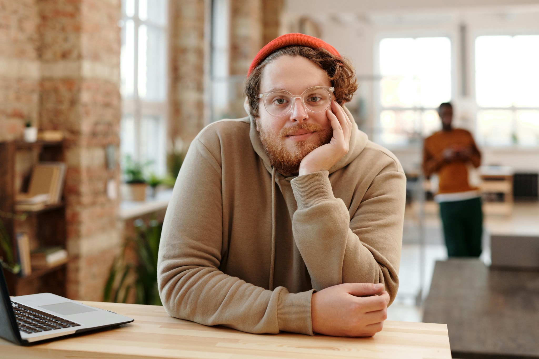Bearded man wearing clear frame glasses UK