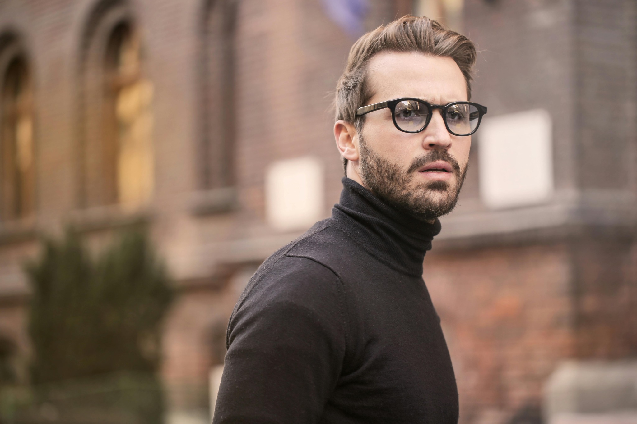 Stylish man in black glasses UK